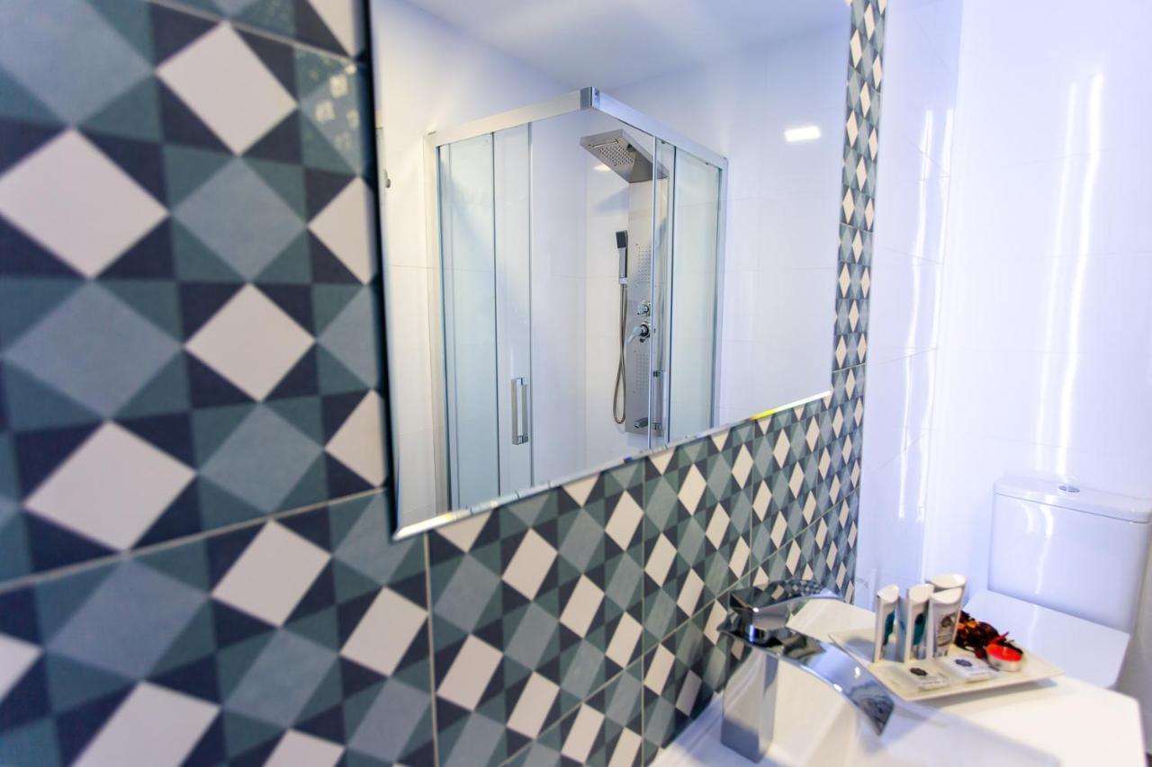 Apartamentos Hervas Suites ภายนอก รูปภาพ